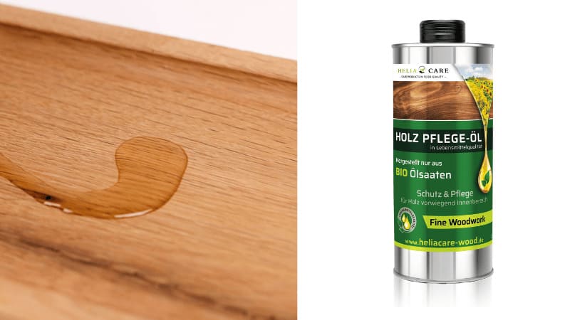 Eine Flasche mit Bio Holzpflege Öl in Lebensmittelqualität - Juvahem, links daneben ein Holzbrett mit Ölspur