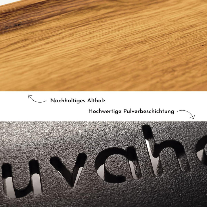 Detailaufnahme von Altholz und pulverbeschichteten, schwarzen Metall, Logo Gravur Juvahem